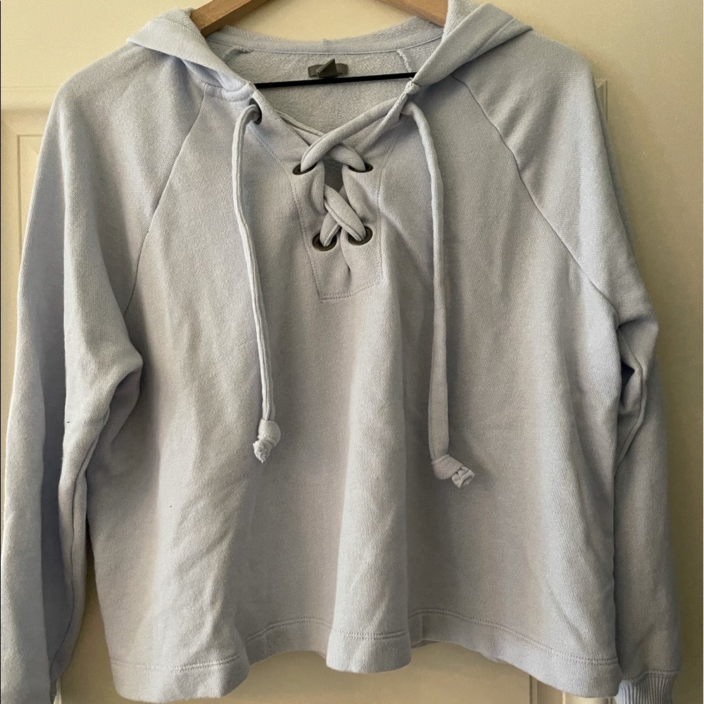 light blue cropped cross sweatshirt